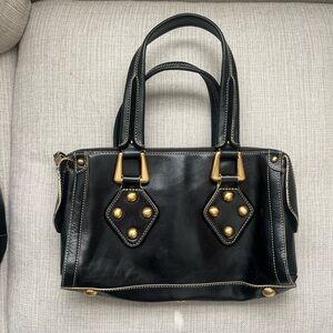 Black Leather Handbag with Gold Accents